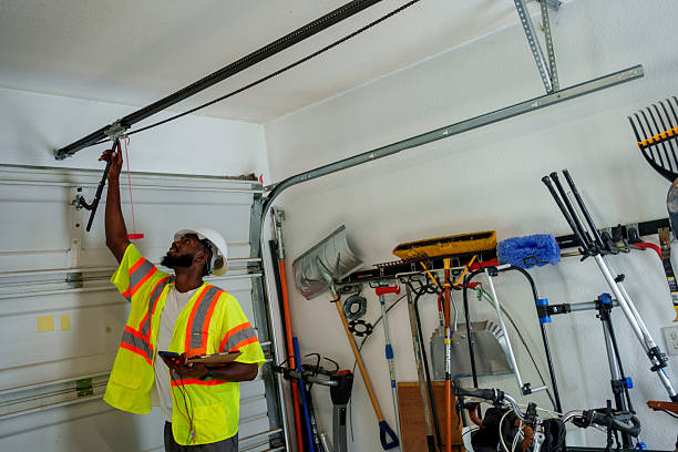 Professional Garage Door Panel Replacement technician working in Woodland Park, CO